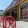 a store front with a red bicycle rack