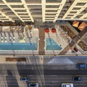 Resort-Style Pool Deck with Year-round Pool and Hot Tub